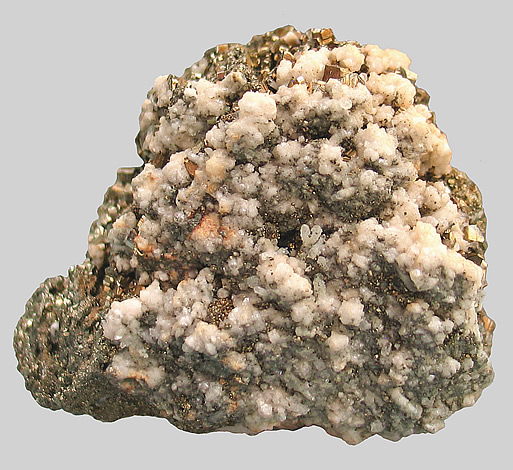 Pyrite pseudomorph after Pyrrhotite with Calcite, Noche Buena Mine, Municipio de Mazapil, Zacatecas, Mexico