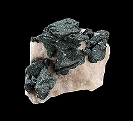 Hematite pseudomorph after Siderite on Microcline, Lake George, Park County, Colorado